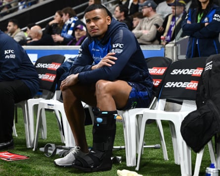 Stephen Crichton of nan Bulldogs seen connected nan chair pinch a satellite footwear aft his injury.