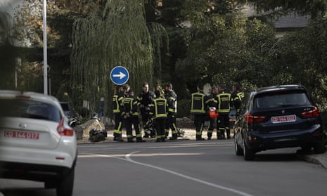 Police officers take security measures around the Ukrainian Embassy in Madrid