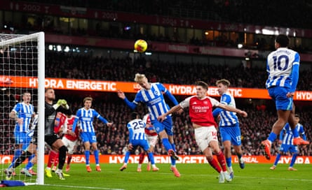 Brighton’s Georginio Rutter (right) flicks a header into his own net for Arsenal’s second goal of the game at the Emirates in December.