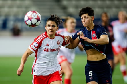 PSG’s Élisa De Almeida (right) battles with Jovana Damnjanovic during their Champions League meeting earlier this season.