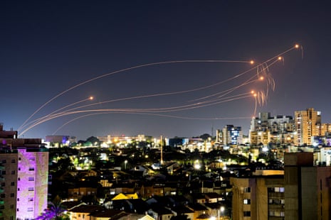 Israel's Iron Dome anti-missile system intercepts rockets launched from the Gaza Strip as seen from Ashkelon, Israel.