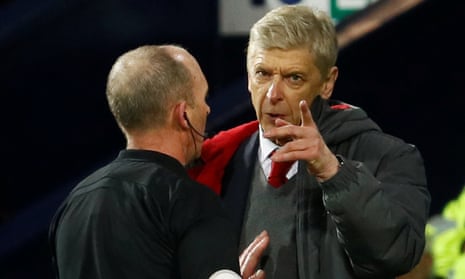 An angry Arsène Wenger makes a point to Mike Dean at Arsenal’s game against West Brom.