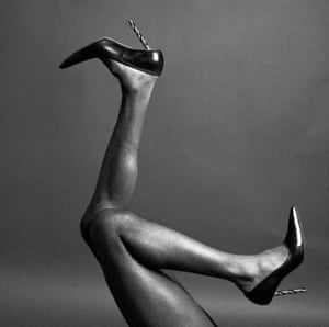 Power Drill Heels, 2021, Ajamu’s playful black and white image constitutes a detail from the photograph Seyon Amosu, Muse (2020)  He says, “The feet and heels belong to my muse Seyon Amosu, and it is based on my own desires for feminine black men in heels. Aside from representing a phallic symbol, the drill bit references the top of a unicorn’s head… this image is Available as a signed 10” x 8” signed, limited edition print from Autograph: https://autograph.org.uk/shop/ajamu-x-limited-edition-print-1118