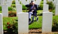 The RAF veteran Bernard Morgan, 100, from Crewe, visits the war graves at Bayeux cemetery in France on 5 June.