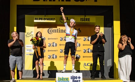 Tadej Pogacar celebrates connected nan podium aft winning shape 19.
