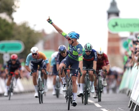 Cyclist Tim Merlier celebrates his victory on stage two of the Tour of Britain