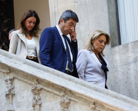 Valencia's regional leader, Carlos Mazón, walks along with the region's vice-president, Susana Camarero, ahead of making an official statement in Valencia, Spain.