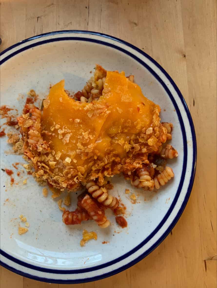 The dish flipped over, revealing its sugary, cheesy, cornflakey crust