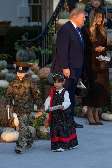 Children dressed in Russian costumes trick or treated at the White House on Thursday.