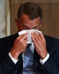 John Boehner wipes his eyes.