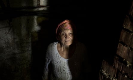 The entrance of a dark and windowless concrete cellar where 72-year-old Nadezhda Ivanova lives.
