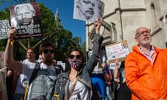 Supporters of Julian Assange outside the US extradition hearing at the Royal Courts of Justice in London on 20 May 2024.