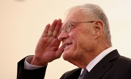 Keith Kellogg smiles and gives a salute