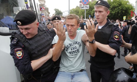 Alexei Navalny is detained by police during a rally in support of an investigative journalist in Moscow in 2019.