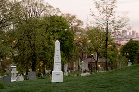 An obelisk in a graveyard