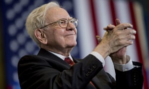 Warren Buffett applauds at a rally for Democratic presidential candidate Hillary Clinton in Omaha, Nebraska.