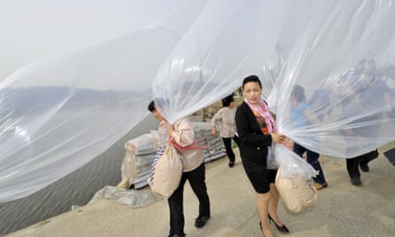 Activists prepare to release balloons carrying chocolates and anti-DPRK leaflets in 2012.