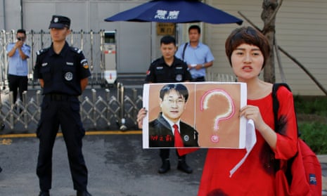 Li Wenzu, wife of detained lawyer Wang Quanzhang, protests in Beijing. 