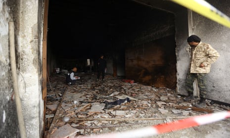 The headquarters of Libya’s elections commission in Tripoli after an attack by suicide bombers. 