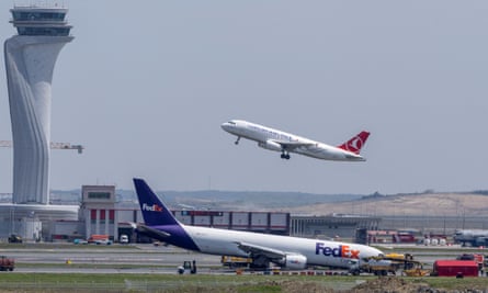 A Boeing 767 cargo plane at Istanbul airport, nose down near the runway