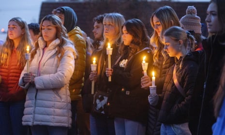 Students attend a vigil for four students killed in Moscow, Idaho.