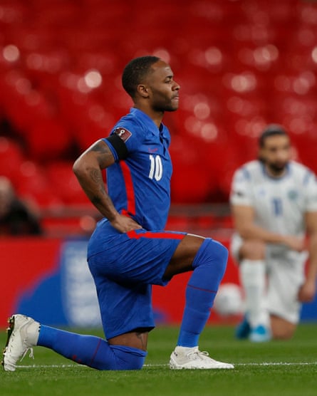 Raheem Sterling kneels against racism before England kick off a World Cup qualifier. Debate over the gesture has loomed large in the culture wars.