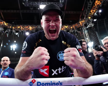 Tyson Fury celebrates his victory over Arslanbek Makhmudov