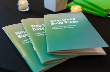 A stack of booklets titled ‘Stop Greed Build Green’.