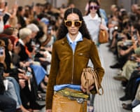 A model on the catwalk at a Miu Miu show.