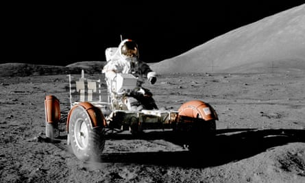 A Nasa astronaut on a lunar rover on the surface of the moon