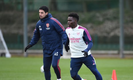 Mikel Arterta (left) and Bukayo Saka at an Arsenal training session