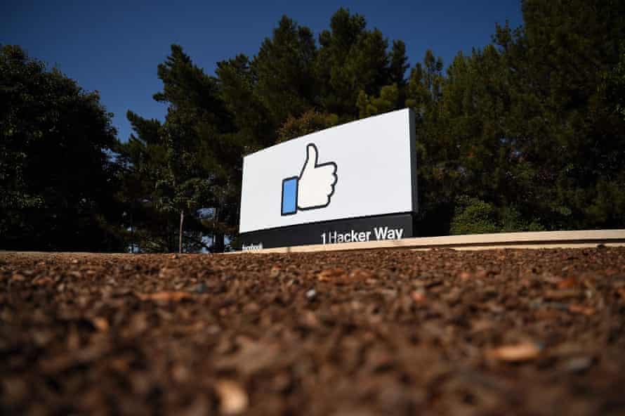 a sign shows a thumbs up at Facebook headquarters