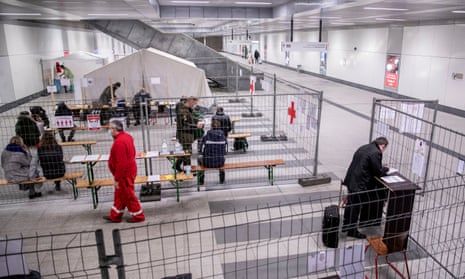 German Red Cross members and soldiers run a Covid-19 testing centre at a station in Berlin. 