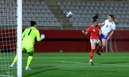 Grace Clinton scores on her England debut against Austria.
