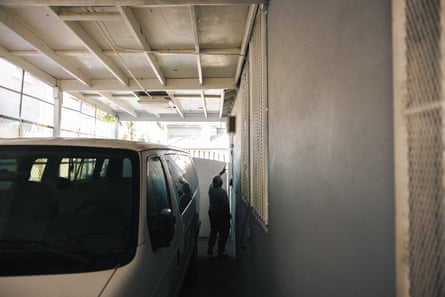 A garage with an air quality sensor attached to the wall.