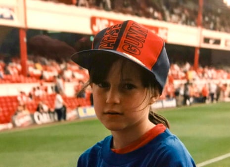 Suzanne Wrack as a young gunner wearing an Arsenal baseball hat at the match as a child.