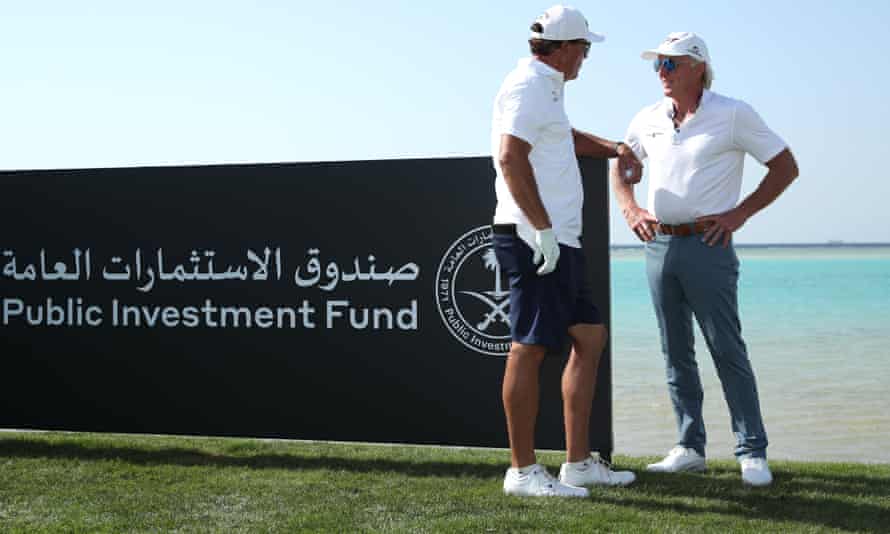 Phil Mickelson and Greg Norman speak during a practice tour before PIF Saudi International at Royal Greens Golf & Country Club in February 2022