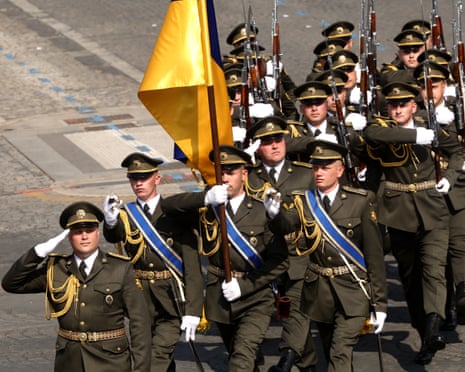 Members of the Ukrainian Armed Forces take part in the Bastille Day military parade on Champs-Elysees Avenue, in Paris, France.