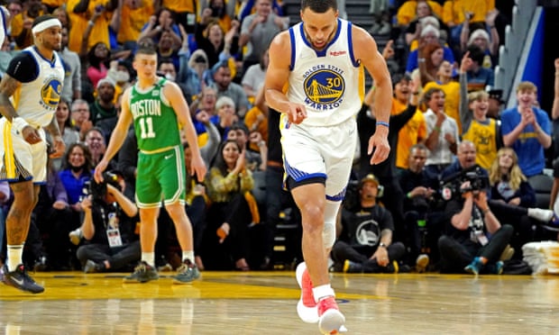 Golden State Warriors guard Stephen Curry (30) reacts after a basket during the third quarter of his team’s NBA finals win over the Boston Celtics