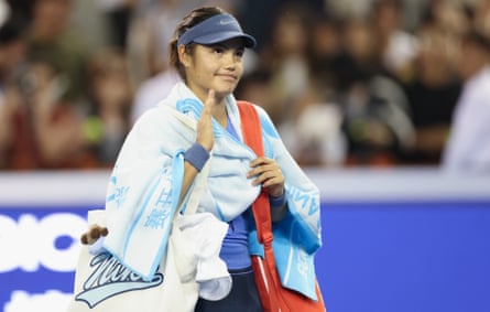 Emma Raducanu leaves the court after her match against Jessica Pegula at the China Open.