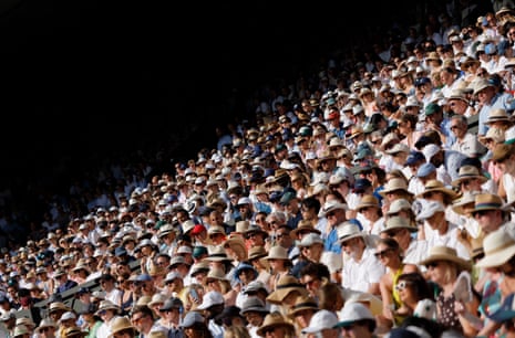 The crowd on Centre Court watch the Sinner v Djokovic semi-final.