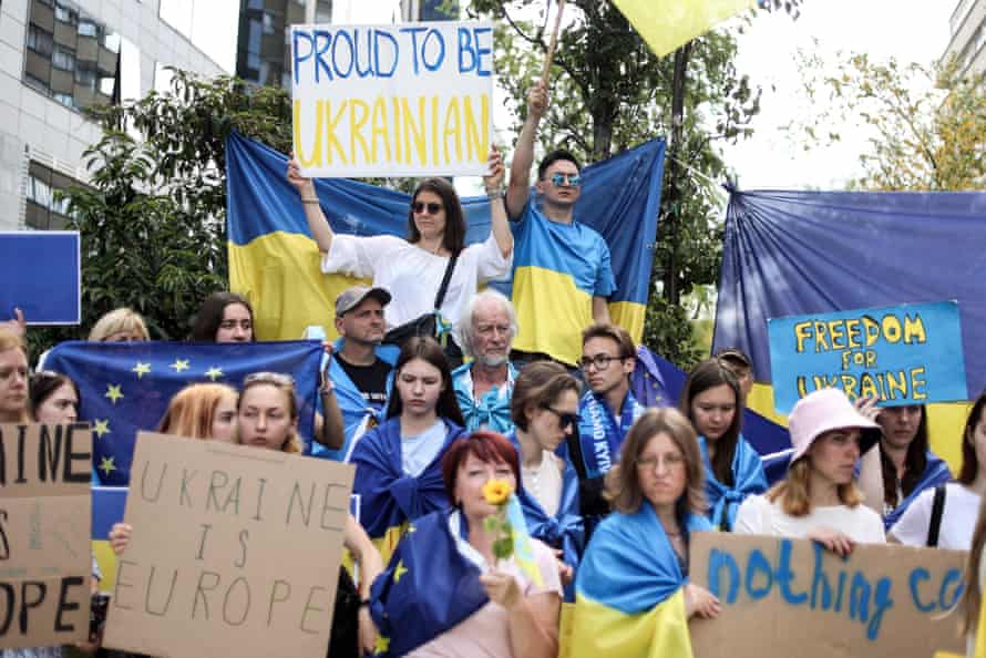 Demonstrators outside the European Headquarters part as they protest in support of Ukraine’s application for EU candidacy status.