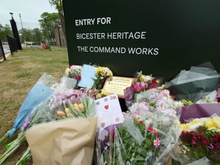 Floral tributes seen on Saturday 17 May, left near the scene of a fire at Bicester.