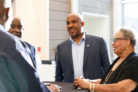 Mississippi Democratic Senate candidate Scott Colom speaks with attendees at an event in Jackson, Mississippi, on 1 August