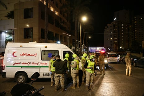 First aid responders gather at the Ramada hotel in Beirut’s seaside Rawche area on 8 March 2026.