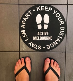 A social distancing sticker at North Melbourne Pool