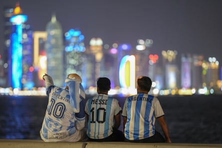 Argentina fans at the Doha Corniche, taking in a view of the city lights.