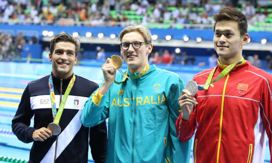 Bronze medalist Gabriele Detti, gold medalist Mack Horton, silver medalist Sun Yang pose during the medal ceremony for the Men’s 400m Freestyle at the Rio 2016 Olympic Games.