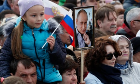 Putin supporters attend a rally celebrating the fourth anniversary of Russia’s annexation of Crimea in Sevastopol, Republic of Crimea, Russia.