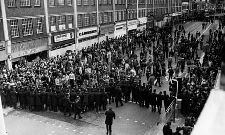 Riots in Southall … Police form a line across a crowded street, 24 May 1979.
